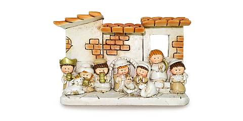 Presepe per bambini con capanna e 10 personaggi in resina - 14,5 x 10 cm